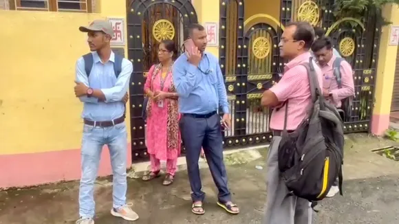 CBI officials outside the residence of former principal of RG Kar Medical College Sandip Ghosh, in Kolkata, Sunday, Aug. 25, 2024.