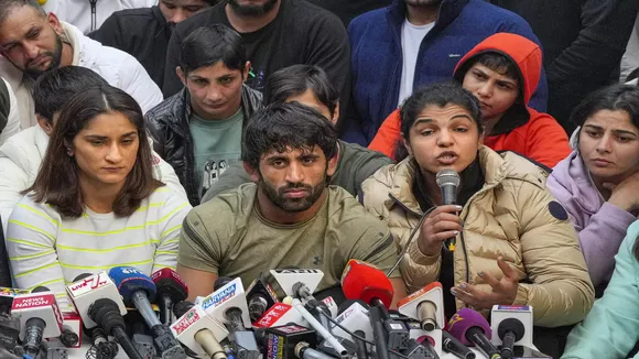 Wrestlers Vinesh Phogat Bajrang Punia and Sakshi Malik at Jantar Mantar during protest, in New Delhi