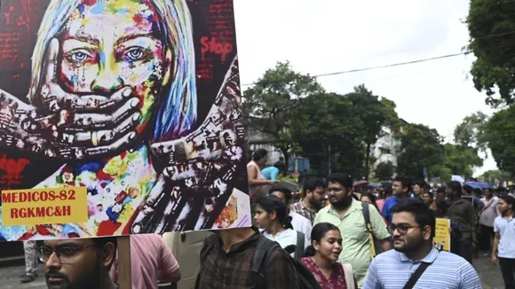 Junior doctors take part in a protest rally against the alleged sexual assault and murder of a postgraduate trainee doctor at R G Kar Medical College and Hospital, in Kolkata