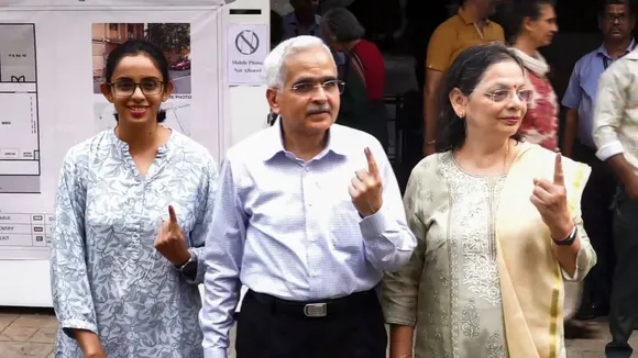RBI Governor Shaktikanta Das shows his inked finger after casting his vote during the fifth phase of Lok Sabha elections, in Mumbai, Monday, May 20, 2024.