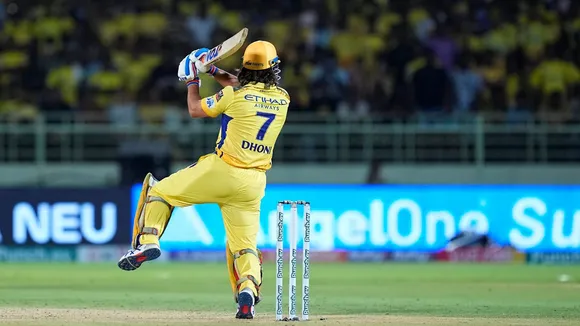 Chennai Super Kings' batter Mahendra Singh Dhoni plays a shot during the IPL 2024 cricket match between Chennai Super Kings and Delhi Capitals