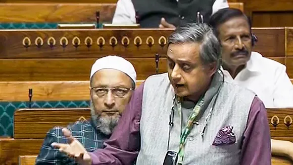 Congress MP Shashi Tharoor speaks in the Lok Sabha during the Winter session of Parliament, in New Delhi