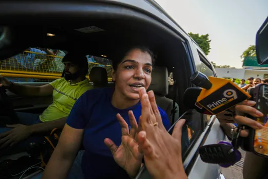 Wrestler Sakshi Malik leaves from the residence of Union Minister for Youth Affairs & Sports Anurag Thakur after a meeting, in New Delhi