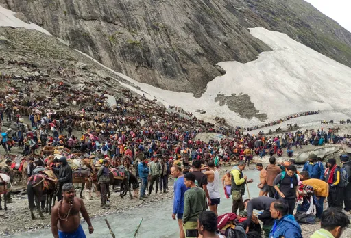 Pilgrims on their way to the holy cave shrine of Amarnath, in Jammu & Kashmir, Thursday.jpg
