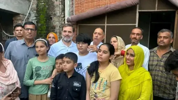 Leader of Opposition in Lok Sabha Rahul Gandhi during a visit to Ghogripur village with the family of Amit, a young man who was injured in a road accident in the US, in Karnal district, Friday, Sept. 20, 2024.