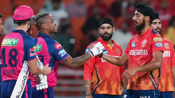 Rajasthan Royals batter Shimron Hetmyer and Punjab Kings Arshdeep Singh exchange greetings at Maharaja Yadavindra Singh International Cricket Stadium, in Mullanpur, Mohali, Saturday, April 13, 2024. Rajasthan Royals won the match by 3 wickets.