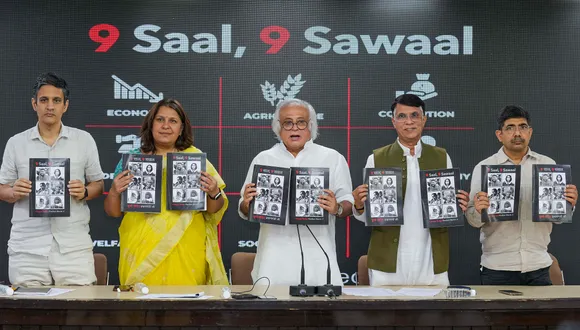 Congress party leader Jairam Ramesh with party leaders Supriya Shrinate (2L) and Pawan Khera (2R) and others during a press conference, in New Delhi