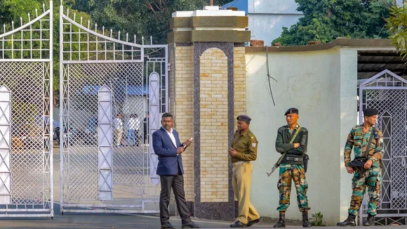 Security personnel stand guard outside the official residence of Jharkhand Chief Minister Hemant Soren, in Ranchi