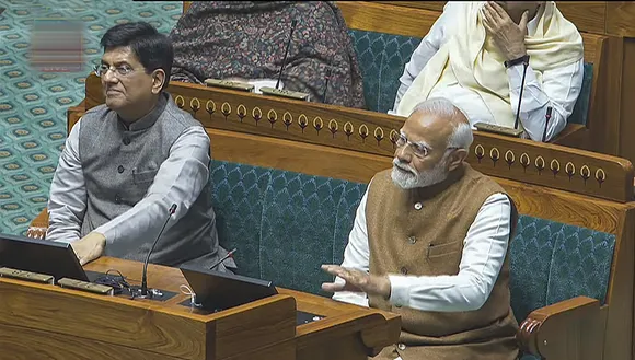 Prime Minister Narendra Modi and Union Minister Piyush Goyal during President Droupadi Murmu's address to the joint sitting of Parliament