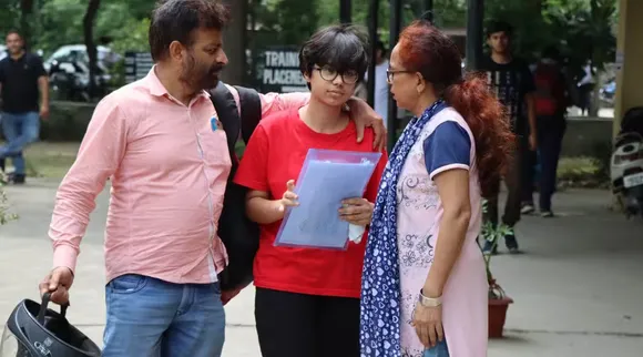 Kota student with parents.jpg