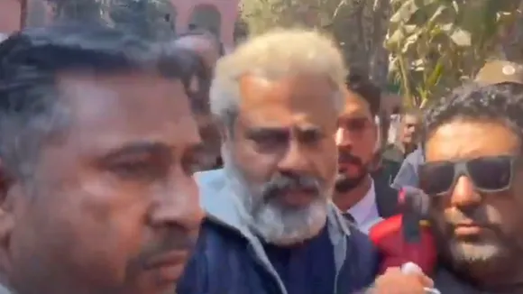 A still from a video of Imran Riaz Khan getting arrested