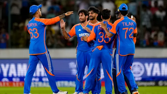 Ravi Bishnoi celebrates with teammates after taking the wicket of Bangladesh's captain Najmul Hossain Shanto during the third and final T20 International cricket match between India and Bangladesh at Rajiv Gandhi International Cricket Stadium, in Hyderabad, Saturday, Oct. 12, 2024.