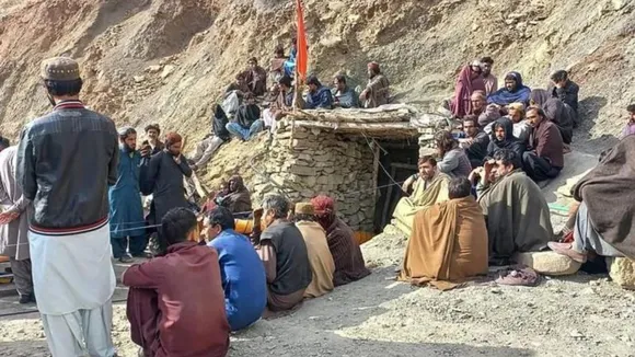 Miners outside a coalpit in the mining region of Khost in Balochistan province, on March 20, 2024