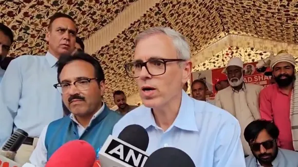 National Conference leader Omar Abdullah talking to reporters