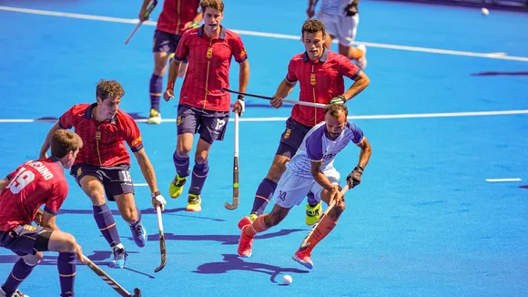 India's Lalit Kumar Upadhyay (14) dribbles during the men's hockey bronze medal match between India and Spain at the 2024 Summer Olympics, in Colombes, France, Thursday, Aug. 8, 2024.