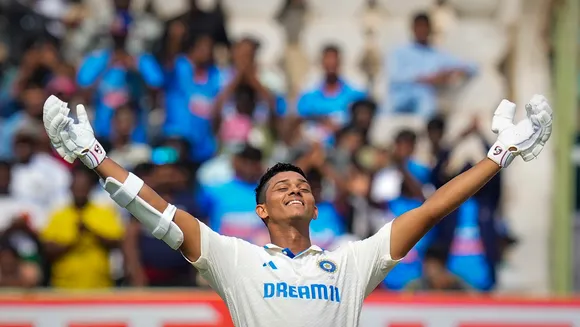 India's batter Yashasvi Jaiswal celebrates his century during the first day of the second Test cricket match between India and England