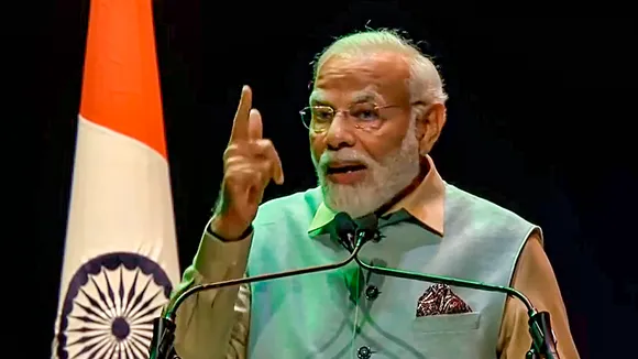 Prime Minister Narendra Modi addresses the Indian community event at La Seine Musicale, in France, Thursday, July 13