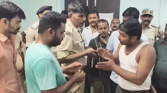 Relatives of the victim explaining their situation to the police at the hospital in Supaul on Wednesday