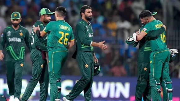 South Africa's batters Keshav Maharaj and Tabraiz Shamsi meet Pakistan players after winning the ICC Men's Cricket World Cup 2023 match against Pakistan, at MA Chidambaram Stadium, in Chennai, Friday, Oct. 27, 2023.