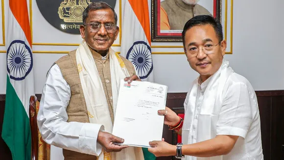 Sikkim Krantikari Morcha (SKM) leader Prem Singh Tamang meets State Governor Lakshman Prasad Acharya to stake claim to form the government in the state at Raj Bhavan, in Gangtok, Sikkim