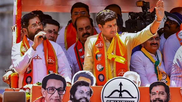 Maharashtra CM Eknath Shinde with Shiv Sena (Shinde faction) candidate Skrikant Shinde at a roadshow before the latter filed his nomination papers for Lok Sabha polls, in Kalyan, Mumbai, Thursday, May 2, 2024