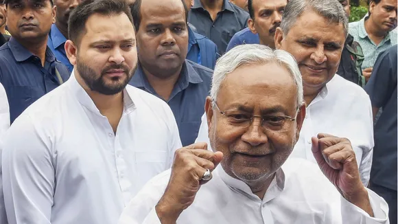 Bihar Chief Minister Nitish Kumar with Deputy Chief Minister Tejashwi Yadav during celebrations of the birth anniversary of Bharatiya Jana Sangh leader Deendayal Upadhyaya, in Patna