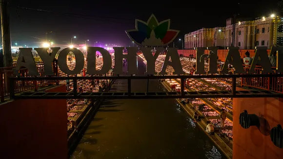 People light earthen lamps at Ayodhya Haat during Deepotsav (Diwali celebrations) in Ayodhya, Saturday, Nov. 11, 2023.