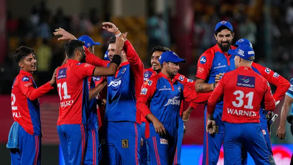 Delhi Capitals players celebrate the wicket of Punjab Kings batter Jitesh Sharma at HPCA Stadium in Dharamshala on May 17