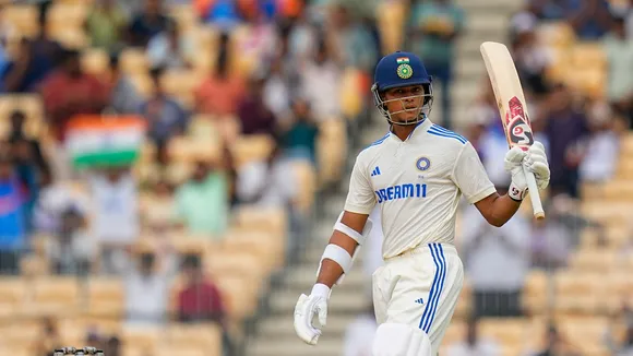 India's Yashasvi Jaiswal celebrates his half-century on the first day of a test cricket match between India and Bangladesh, at the MA Chidambaram Stadium, in Chennai, Thursday, Sept. 19, 2024.