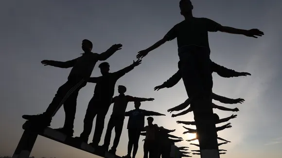 Youngsters do physical exercises for upcoming 'Agniveer' recruitment rally near the International Border in Ranbir Singh Pura of Jammu on Wednesday