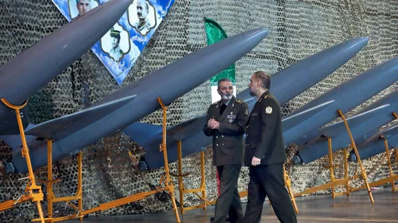 A file photo of Iranian army commander Gen. Abdolrahim Mousavi (left) and Defense Minister Gen. Mohammad Reza Gharaei Ashtiani 