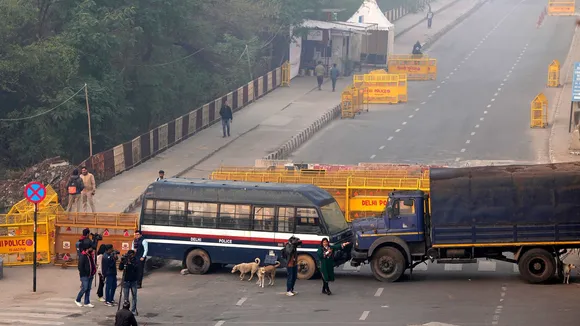 Police barricades put up at Ghazipur border in view of farmers' 'Delhi Chalo March', in New Delhi
