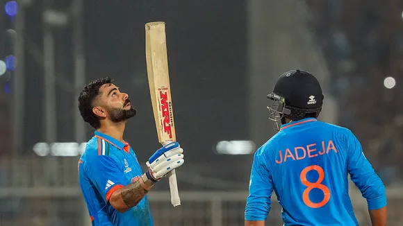 Virat Kohli celebrates after his century during the ICC Men's Cricket World Cup 2023 match between India and South Africa, at Eden Gardens, in Kolkata, Sunday, Nov. 5, 2023. 