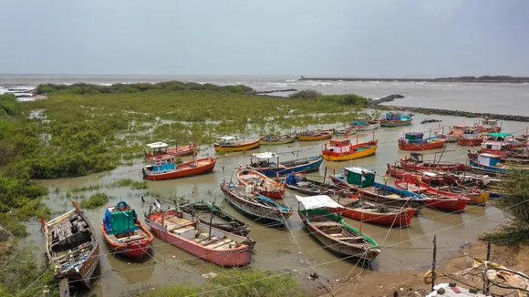 An aerial view of fishing boats anchored outside Mandvi port ahead of Cyclone Biparjoy's landfall in Kutch district