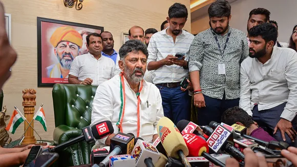 Karnataka Congress President D.K. Shivakumar addresses the media at his residence in Bengaluru on May 15