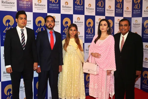 Mukesh Ambani, right, with (from 2nd right to left) wife Nita Ambani, children Isha Ambani, Anant Ambani, and Akash Ambani.