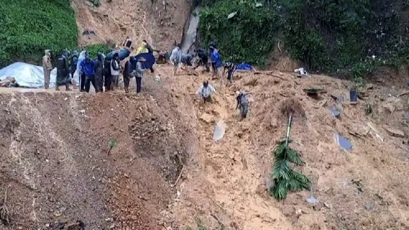Debris being cleared after landslides due to incessant rains in the aftermath of Cyclone Remal