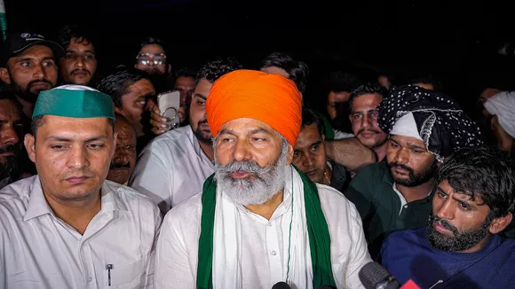 BKU leader Rakesh Tikait talks to the media while meeting wrestlers during their ongoing protest on May 4