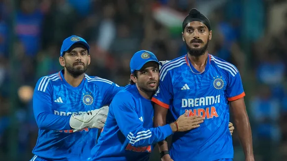 Indian bowler Arshdeep Singh celebrates the wicket of Australian batter Ben McDermott