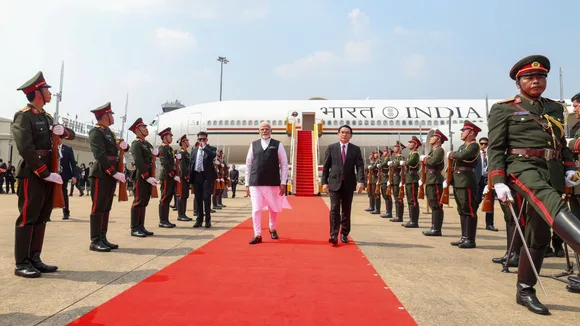 Prime Minister Narendra Modi being warmly welcomed by Minister of Home Affairs of Laos, Mr. Vilayvong Bouddakham.