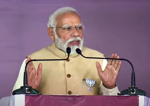 Prime Minister Narendra Modi speaks during a public meeting ahead of Karnataka Assembly elections, in Humnabad