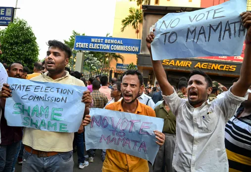 BJP workers protest stage a protest against Trinamool Congress party over obstruction by TMC in filing of nomination papers for panchayat polls by the BJP candidates, in front of West Bengal State Election Commission office, in Kolkata