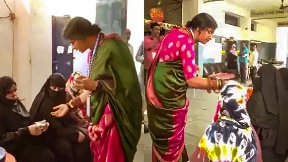 BJP candidate Madhavi Latha checks identity of voters at a polling station during the fourth phase of Lok Sabha elections, in Hyderabad, Monday, May 13, 2024