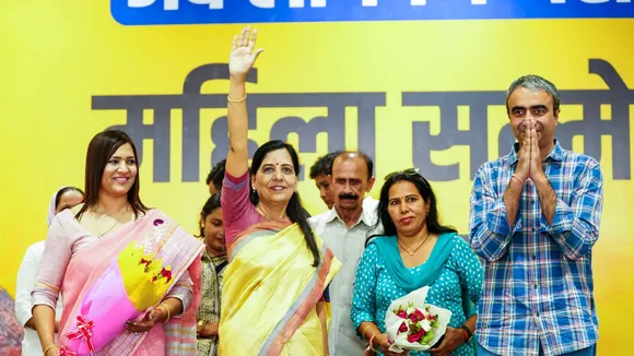 Sunita Kejriwal, wife of Delhi CM and AAP convenor Arvind Kejriwal, with AAP leader Anurag Dhanda during a women's conference ahead of the Haryana Assembly elections, in Bhiwani, Saturay, Sept. 7, 2024.