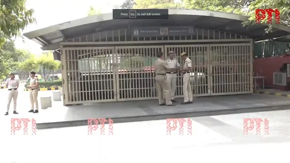 Security tightened outside Lok Kalyan Marg metro station in view of AAP's call to 'gherao' PM Modi's residence against arrest of Delhi CM Arvind Kejriwal.