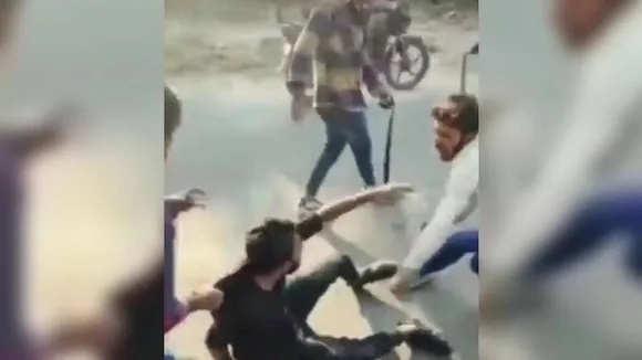 Videograb of a dalit youth being thrashed in Vadodara