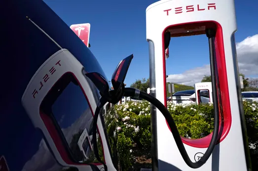 Ford electric vehicle tesla supercharger station.jpg