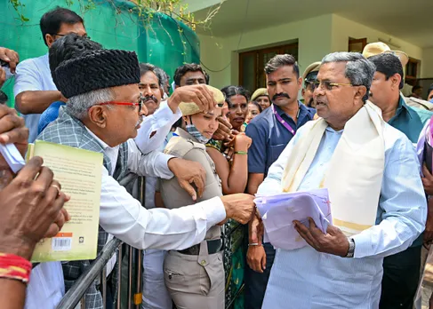 Karnataka Chief Minister Siddaramaiah receives representations from the public at his residence, in Bengaluru