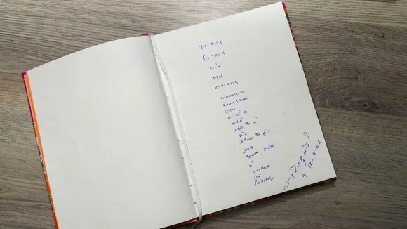 Prime Minister Narendra Modi's poem titled 'aachaar, vichaar or ab samachar' written by him in the visitor's book, during his visit at the PTI's headquarters, in New Delhi, Saturday, Dec. 9, 2023.