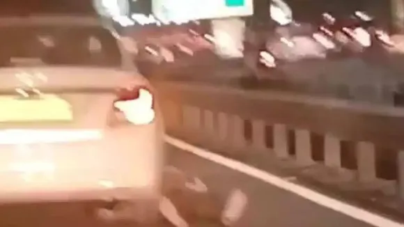 man dragged by car